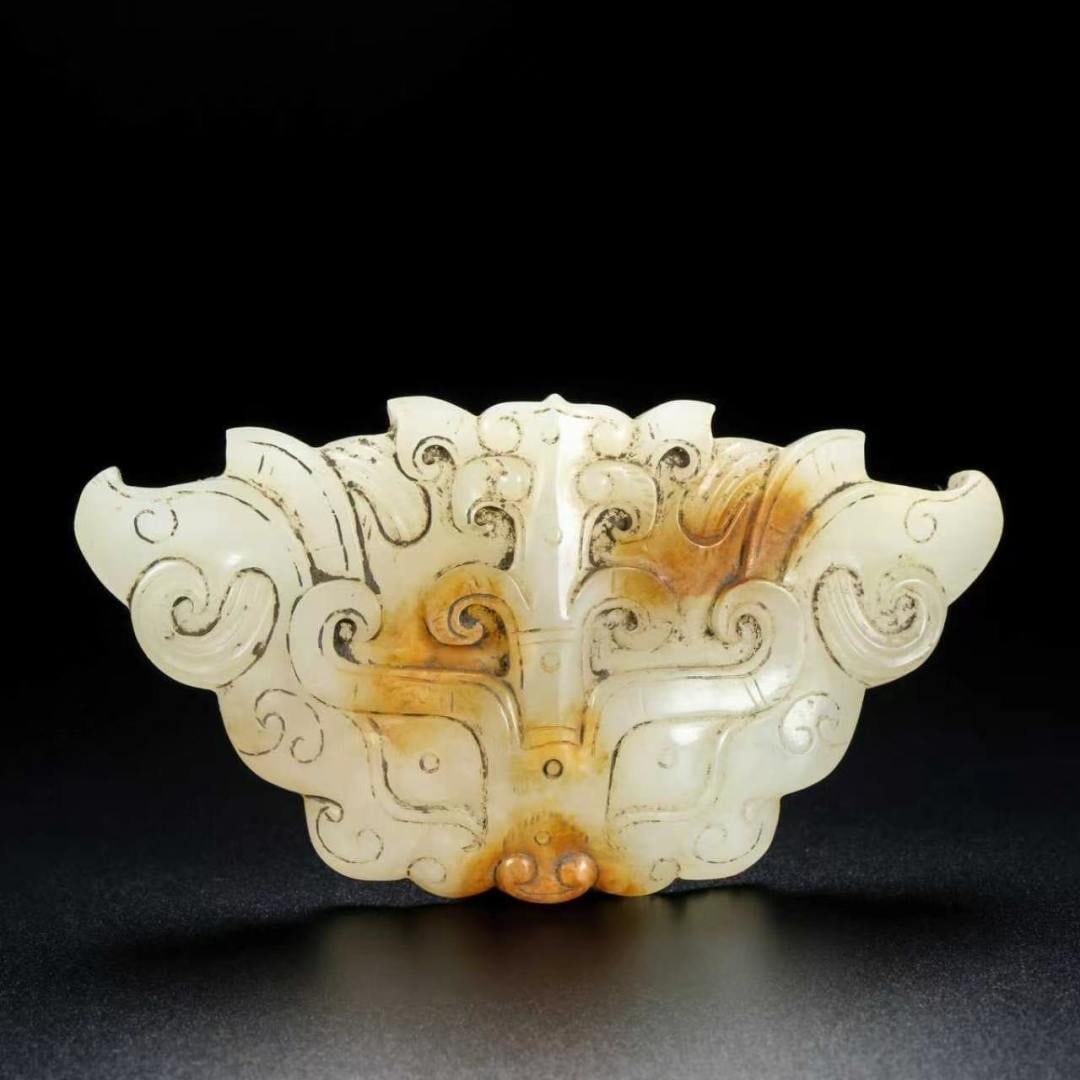 A Exquisite Hotan Jade Beast-Face Buckle: A Exquisite Hotan Jade Beast-Face Buckle,Han Dynasty, China,Size:4.3inx2.4inx0.8in ,Weight:103g 和田玉兽面带扣,中国汉代