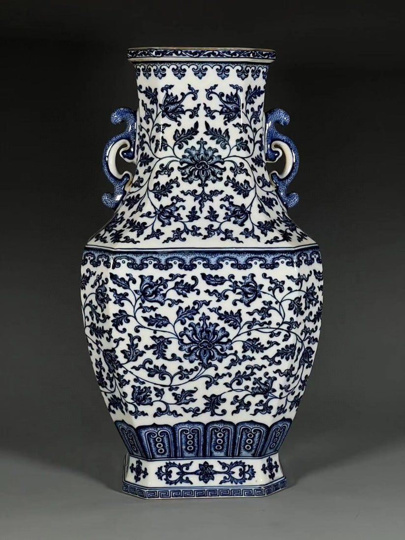 A Exquisite Blue and White Lotus Pattern Double-Ears Vase: A Exquisite Blue and White Lotus Pattern Double-Ears Vase,Qing Dynasty, China,Qianlong Six-character Mark,Size:16.9inx5.6inx6.5in 青花缠枝莲纹双耳ல