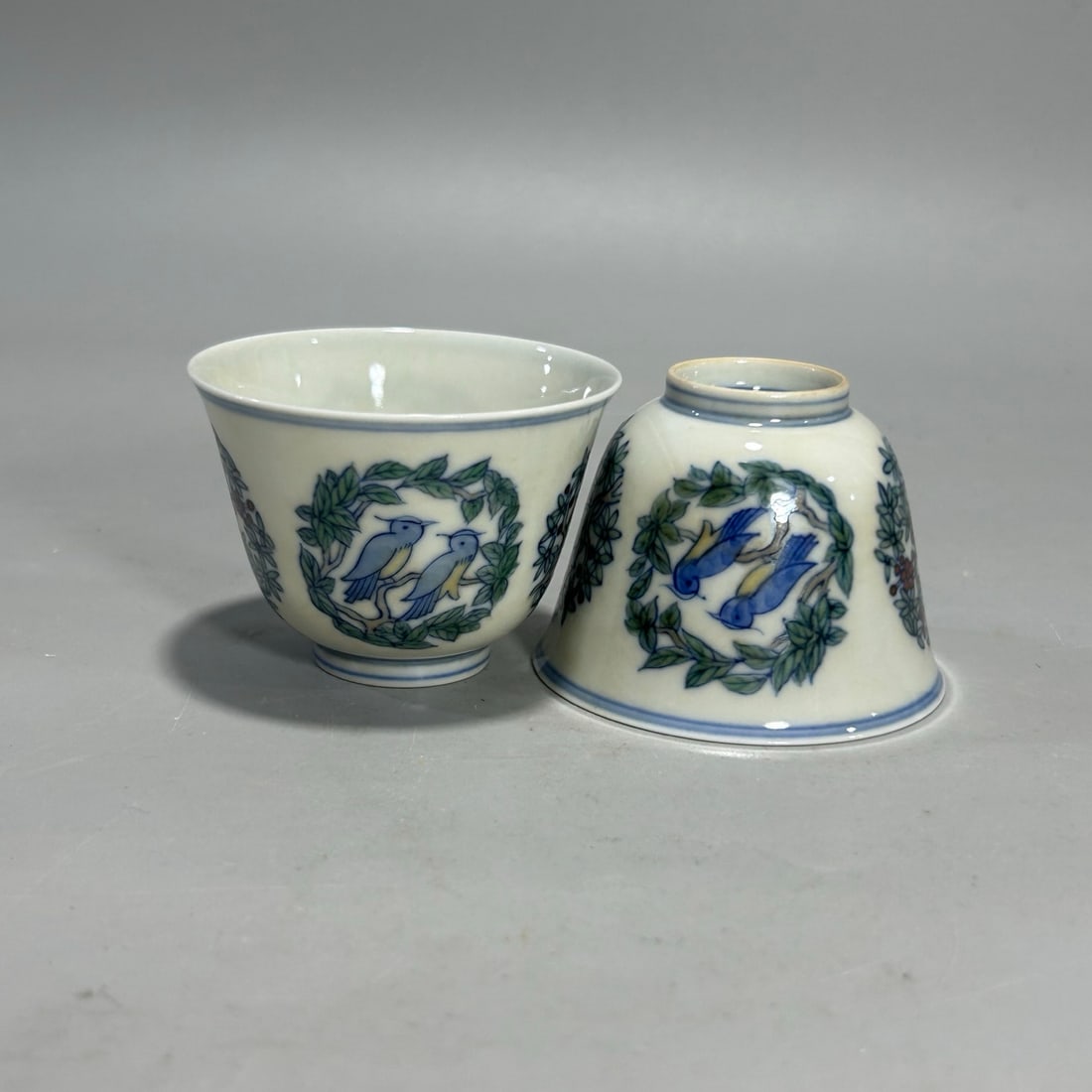 A pair of Exquisite Doucai Flower and Bird Pattern Cup: A pair of Exquisite Doucai Flower and Bird Pattern Cup,Qing Dynasty, China,Yongzheng Six-character Mark,Size:2.6inx2in 一对斗彩花鸟纹杯,中国