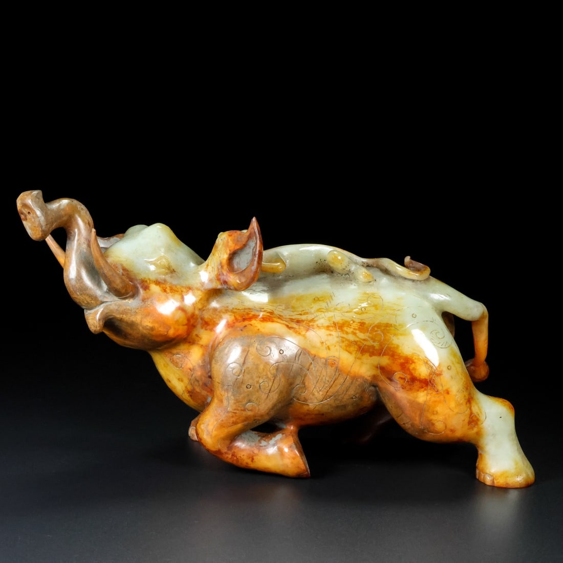 A Exquisite Hotan Jade Elephant Ornament: A Exquisite Hotan Jade Elephant Ornament,Han Dynasty, China,Size:9.8inx3.9inx5.5in ,Weight:2200g 和田玉象摆件,中国汉代
