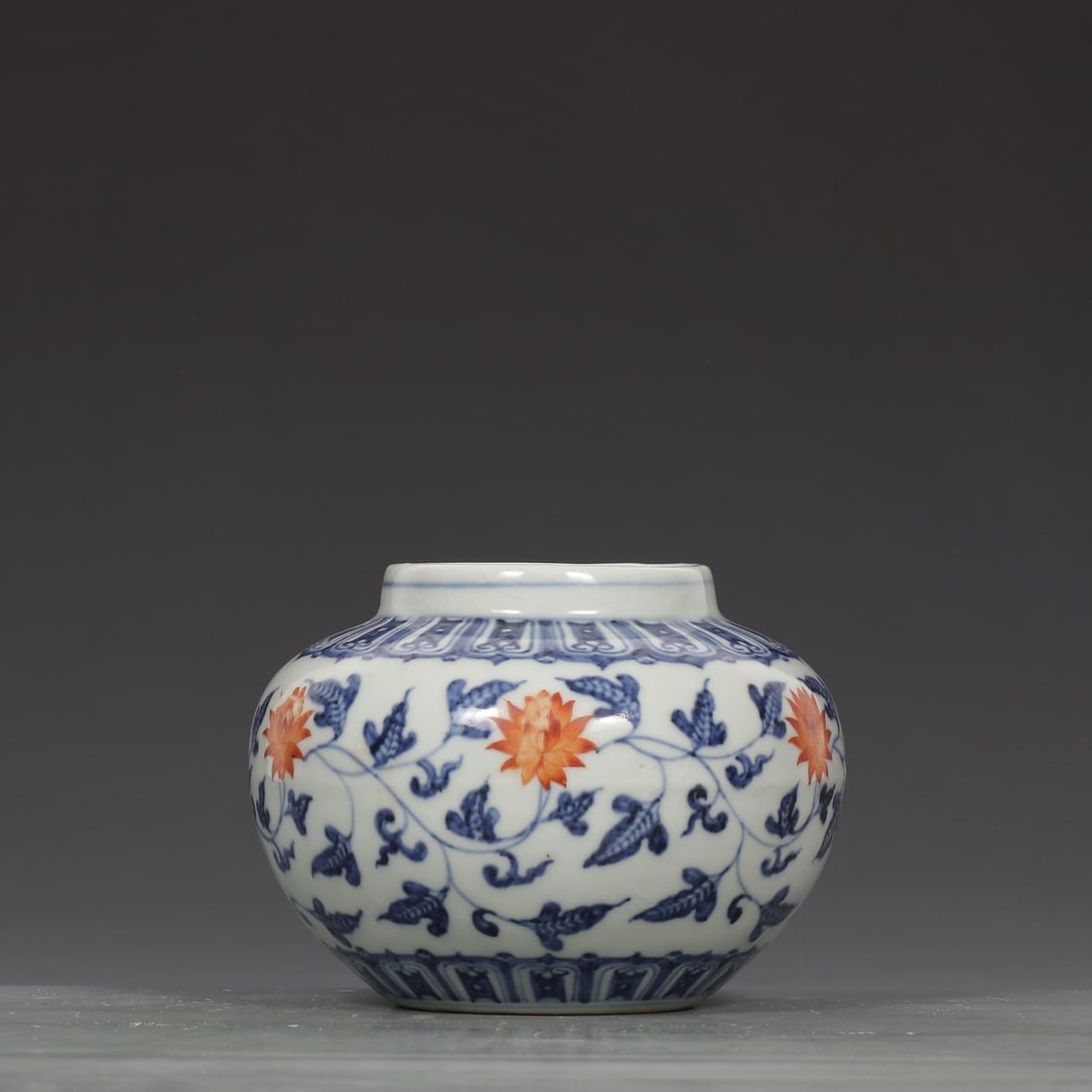 A Exquisite Blue and White Iron-Red Lotus Pattern Jar: A Exquisite Blue and White Iron-Red Lotus Pattern Jar,Ming Dynasty, China,Xuande Six-character Mark,Size:4.5inx3.2inx6.1in 青花矾红缠枝莲纹罐,