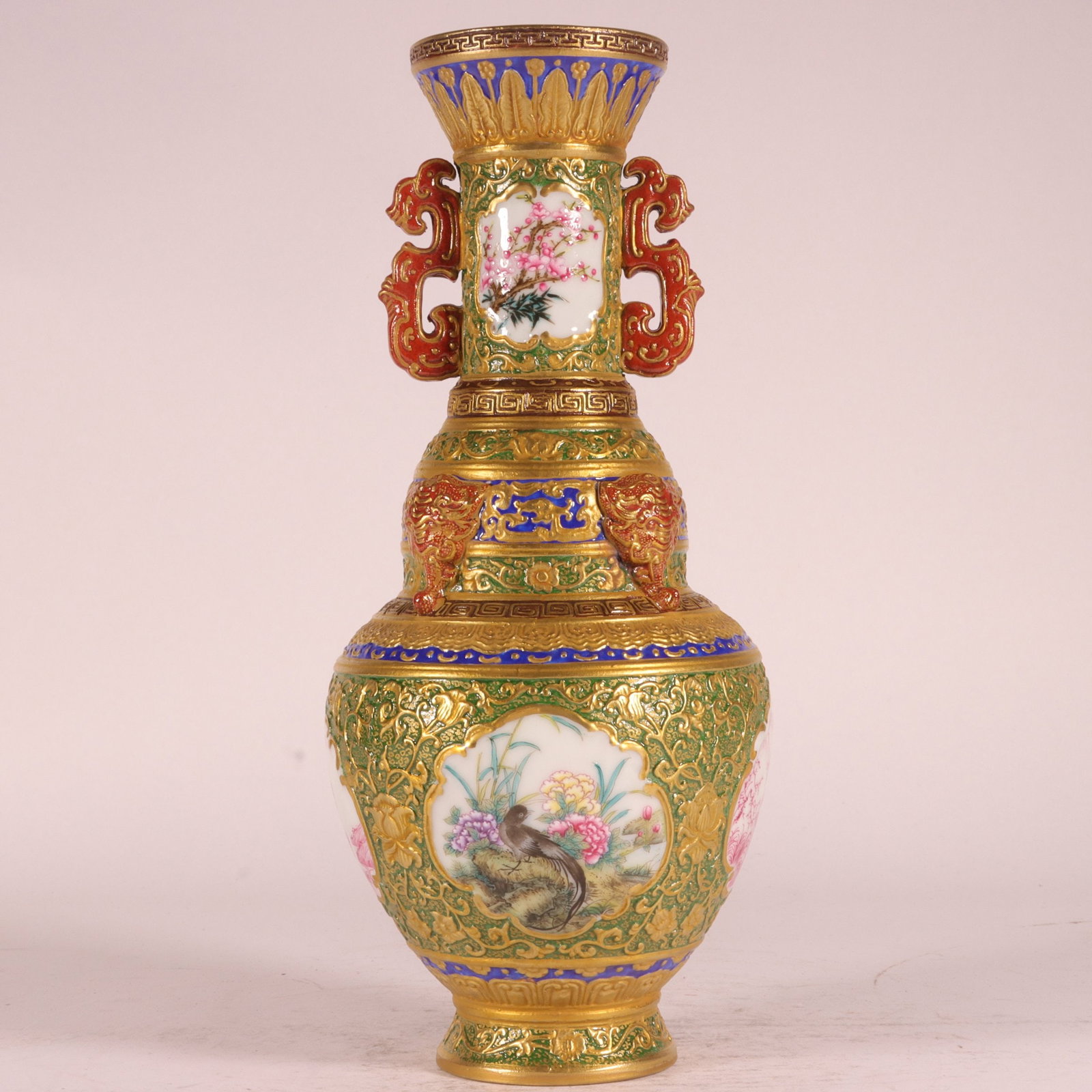 A Exquisite Enamel Green Ground Carved Painted Gold Flower and Bird Pattern Double-Ears Vase: A Exquisite Enamel Green Ground Carved Painted Gold Flower and Bird Pattern Double-Ears Vase,Qing Dynasty, China,Qianlong Six-character Mark,Size:10inx4.3in 珐琅彩绿地