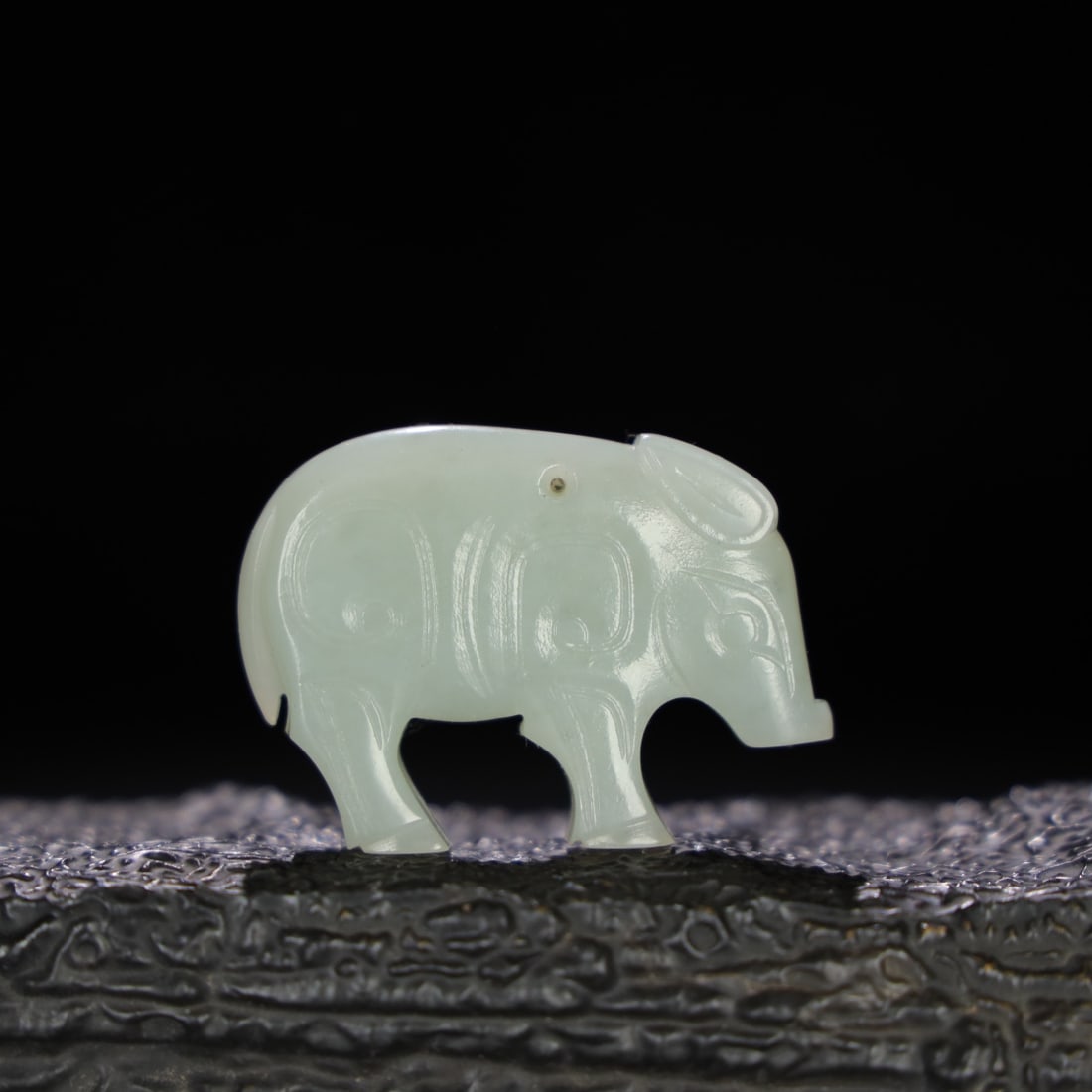A Exquisite Hotan Jade Pig Ornament: A Exquisite Hotan Jade Pig Ornament,Qing Dynasty, China,Size:2.1inx0.5inx1.5in,Weight:42.5g 和田玉猪摆件,中国清代