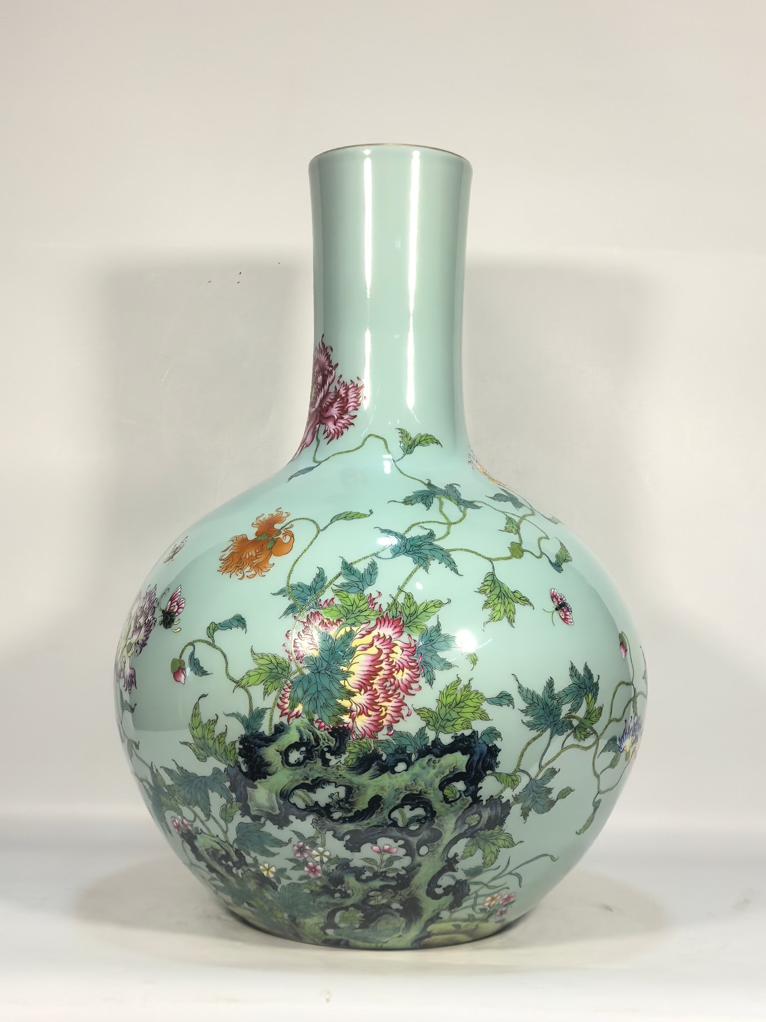 A Exquisite Famille-Rose Sky Blue Glazed Flower Pattern Vase: A Exquisite Famille-Rose Sky Blue Glazed Flower Pattern Vase,Qing Dynasty, China,Qianlong Six-character Mark,Size:21.7inx4.7inx15inx7.5in 粉彩天青釉花卉ಬ