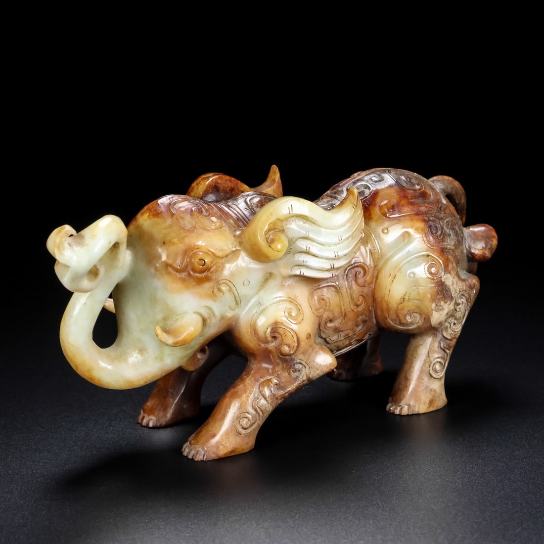 A Exquisite Hotan Jade Elephant Ornament: A Exquisite Hotan Jade Elephant Ornament,Han Dynasty, China,Size:6.7inx2.8inx3.5in ,Weight:750g 和田玉象摆件,中国汉代