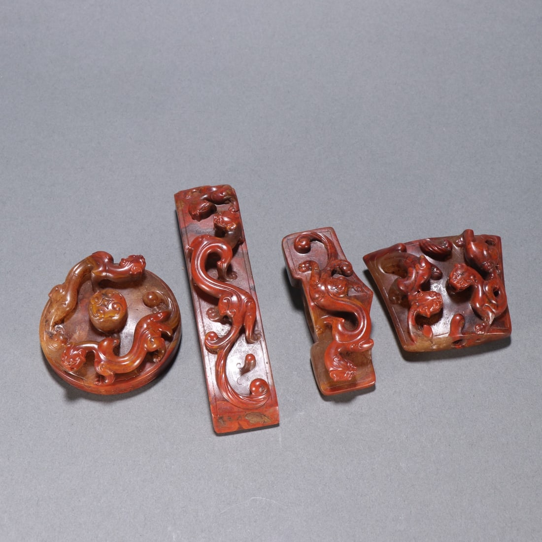 A Set of Exquisite Agate Sword Ornaments: A Set of Exquisite Agate Sword Ornaments,Han Dynasty, China,Size:4.3inx1in,Weight:68.9g 一套玛瑙剑饰,中国汉代