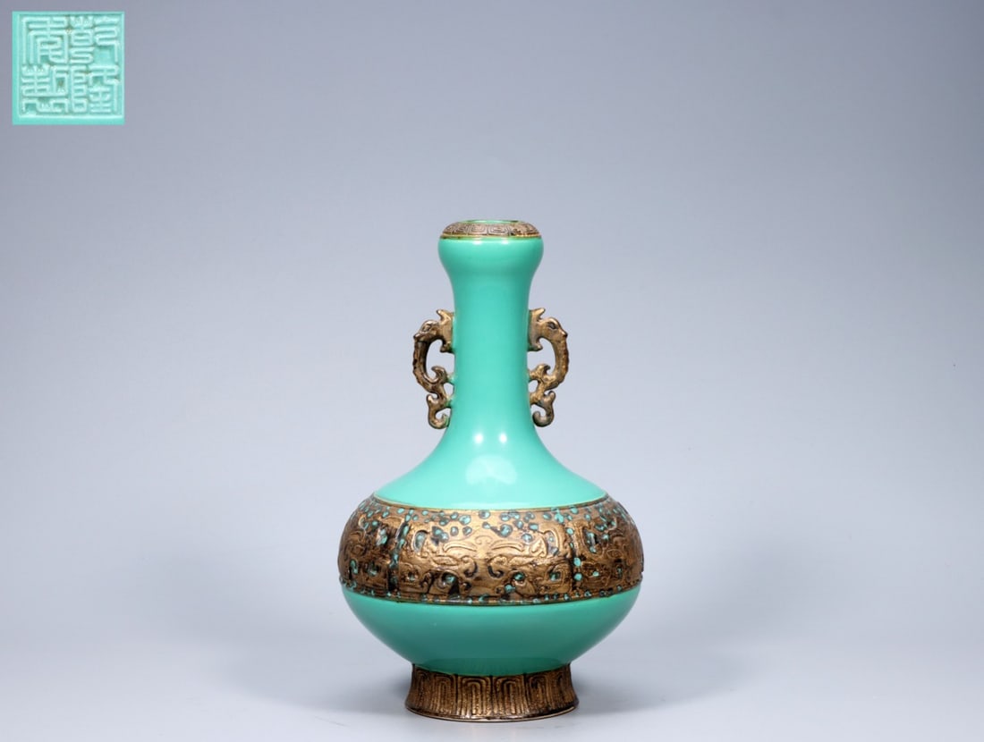A Exquisite Turquoise-Glazed Bronze Color Dragon-Ears Vase: A Exquisite Turquoise-Glazed Bronze Color Dragon-Ears Vase,Qing Dynasty, China,Qianlong Four-character Mark,Size:9.8inx1.4inx5.9inx3.5in,Weight:1197g 松石绿釉古铜&#