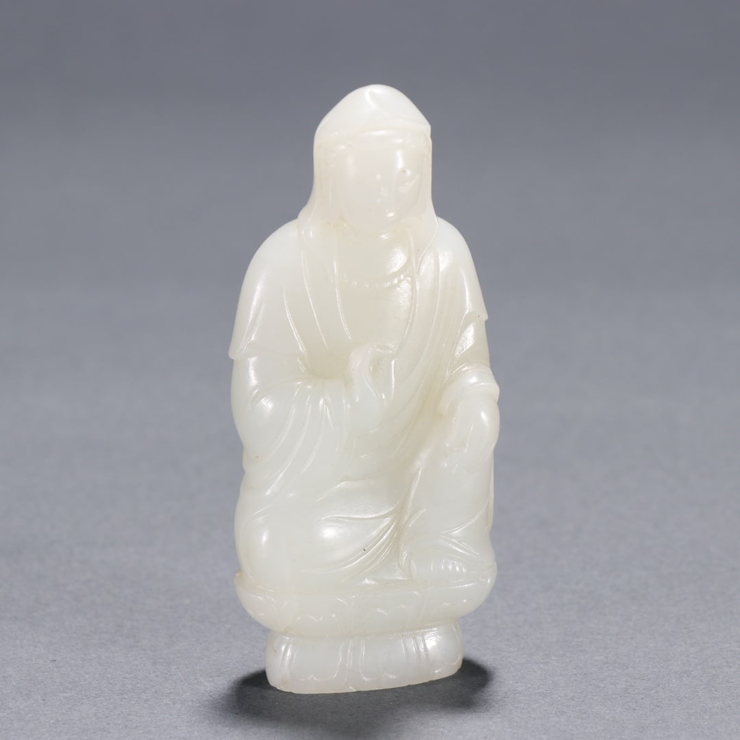 A Exquisite Hotan Jade Statue of Avalokitesvara Ornament: A Exquisite Hotan Jade Statue of Avalokitesvara Ornament,Qing Dynasty, China,Size:1.3inx3in,Weight:75.3g 和田玉观音摆件,中国清代
