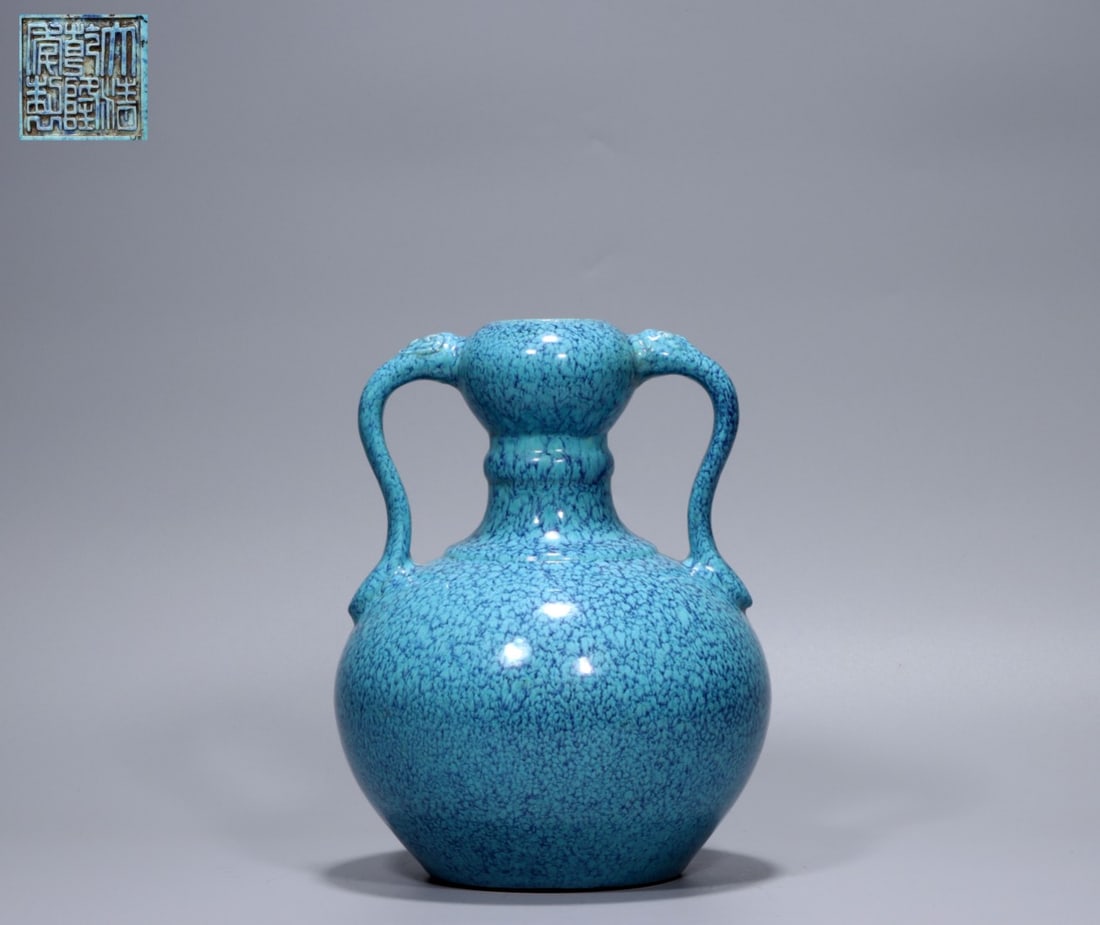 A Exquisite Robin's-Egg-Glazed Ruyi-Ears Vase: A Exquisite Robin's-Egg-Glazed Ruyi-Ears Vase,Qing Dynasty, China,Qianlong Six-character Mark,Size:9.3inx1.8inx7.1inx4.1in,Weight:1860g 炉钧釉如意耳瓶,中