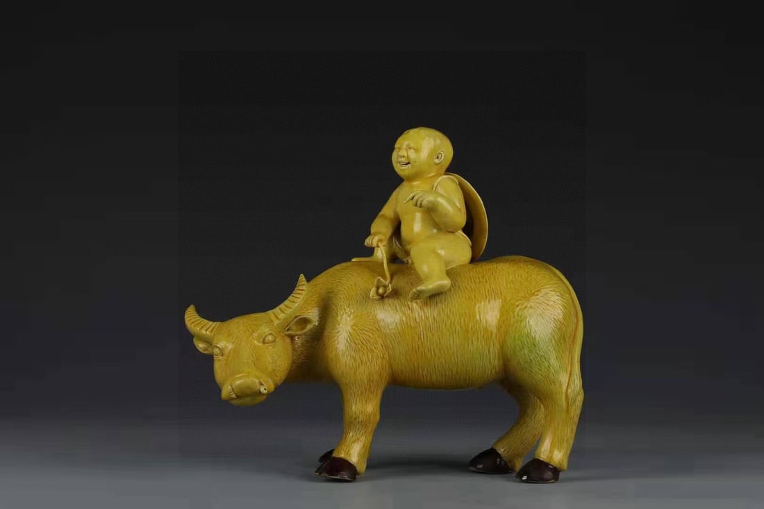 A Exquisite Yellow Glazed Buffalo Herding Ornament: A Exquisite Yellow Glazed Buffalo Herding Ornament,Republic of China,Size:7.7inx5.1in 黄釉牧牛摆件,民国