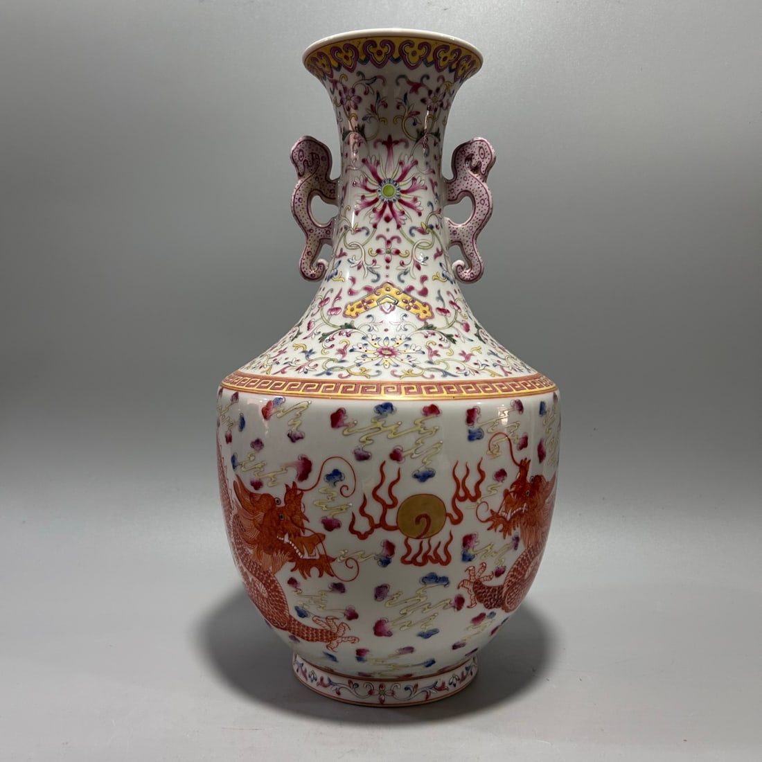 A Exquisite Famille-Rose Dragon Pattern Double-Ears Vase: A Exquisite Famille-Rose Dragon Pattern Double-Ears Vase,Qing Dynasty, China,Qianlong Six-character Mark,Size:5.9inx12.2in 粉彩龙纹双耳瓶,中国