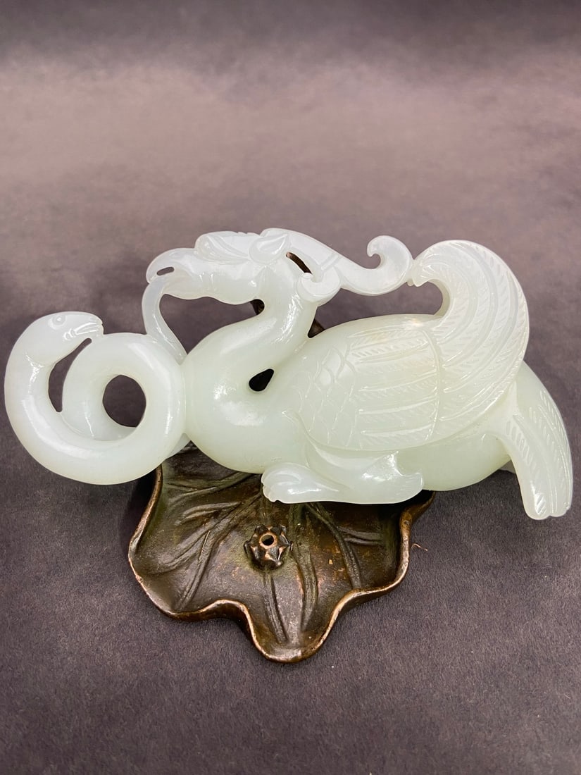 A Exquisite Hotan Jade Phoenix Bird Handheld Carving: A Exquisite Hotan Jade Phoenix Bird Handheld Carving,Han Dynasty, China,Size:3.9inx1.9inx1.3in ,Weight:120g 和田玉凤鸟手把件,中国汉
