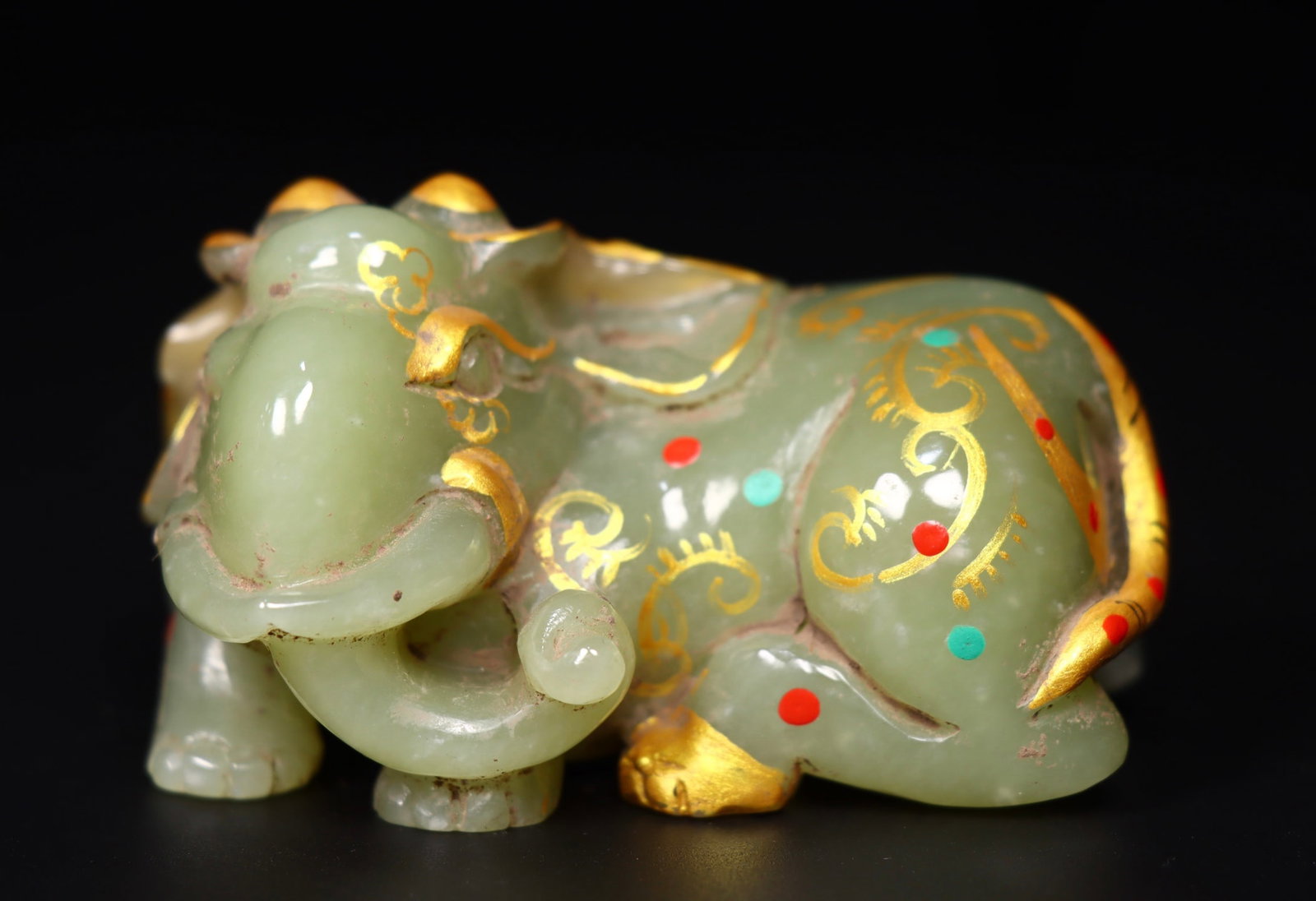 A Exquisite Hotan Jade Painted Color Elephant Ornament: A Exquisite Hotan Jade Painted Color Elephant Ornament,Han Dynasty, China,Size:3.1inx2.5inx1.8in ,Weight:258g