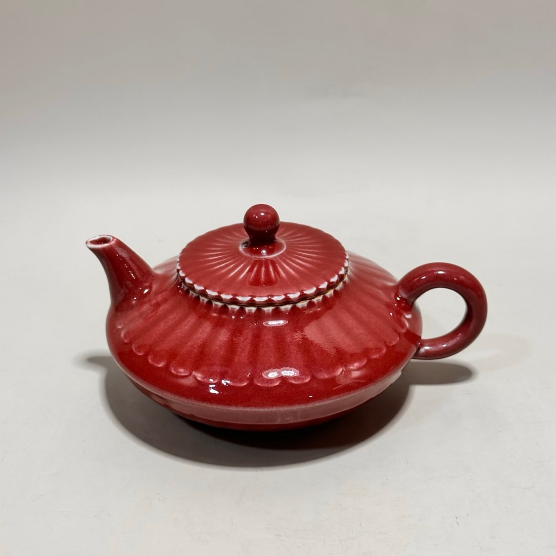 A Exquisite Ji Red Glazed Chrysanthemum Petal Pattern Teapot (1 of 9)