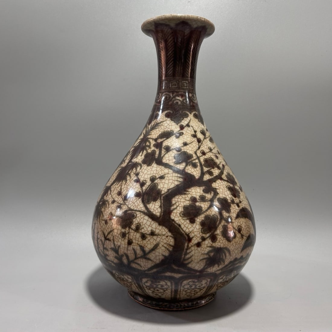 A Exquisite Underglaze-Red Pine and Bamboo Pattern Vase: A Exquisite Underglaze-Red Pine and Bamboo Pattern Vase,Qing Dynasty, China,Size:5.9inx12.2in 釉里红松竹纹瓶,中国清代