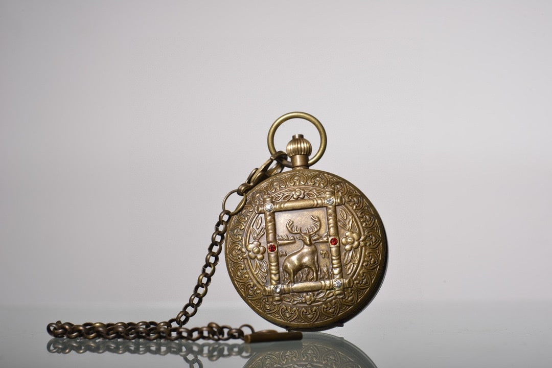 A Exquisite Gilt Bronze Inlaid Gems Sika Deer Pattern Pocket Watch: A Exquisite Gilt Bronze Inlaid Gems Sika Deer Pattern Pocket Watch,Republic of China,Size:2.2in 铜鎏金嵌宝石鹿纹怀表,民国