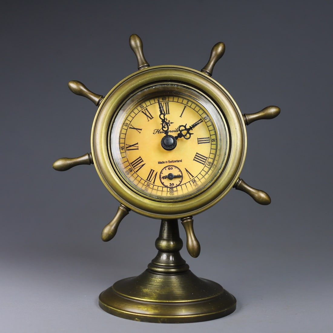 A Exquisite Coppery Rudder Shape Table Clock: A Exquisite Coppery Rudder Shape Table Clock,Qing Dynasty, China,Size:5.1inx3.1inx6.3in 铜造船舵形闹钟,中国清代