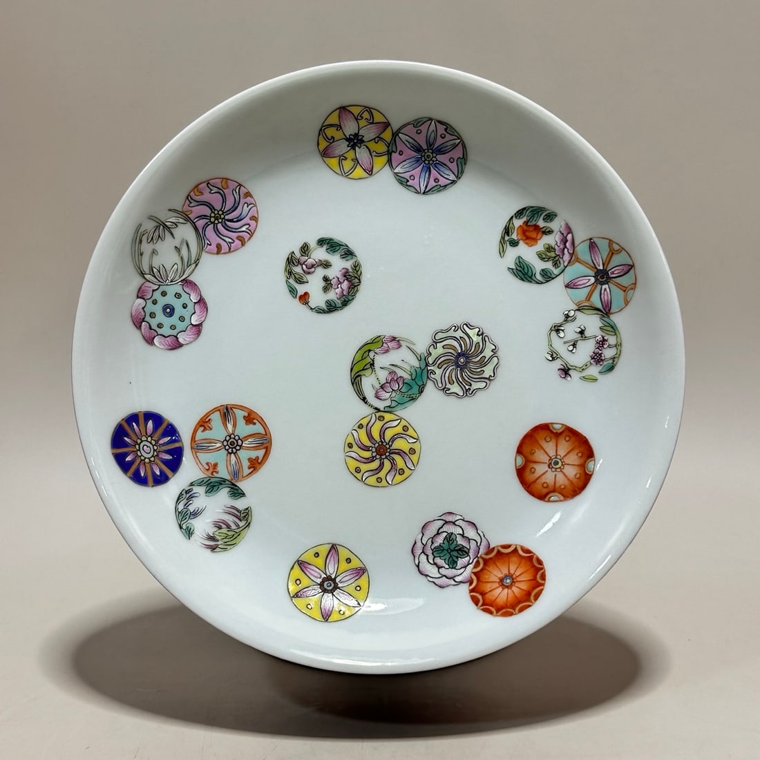 A Exquisite Ruby Red-Glazed Famille-Rose Flower Pattern Plate: A Exquisite Ruby Red-Glazed Famille-Rose Flower Pattern Plate,Qing Dynasty, China,Qianlong Six-character Mark,Size:1.1inx6.3inx3.7in 胭脂红粉彩花卉纹