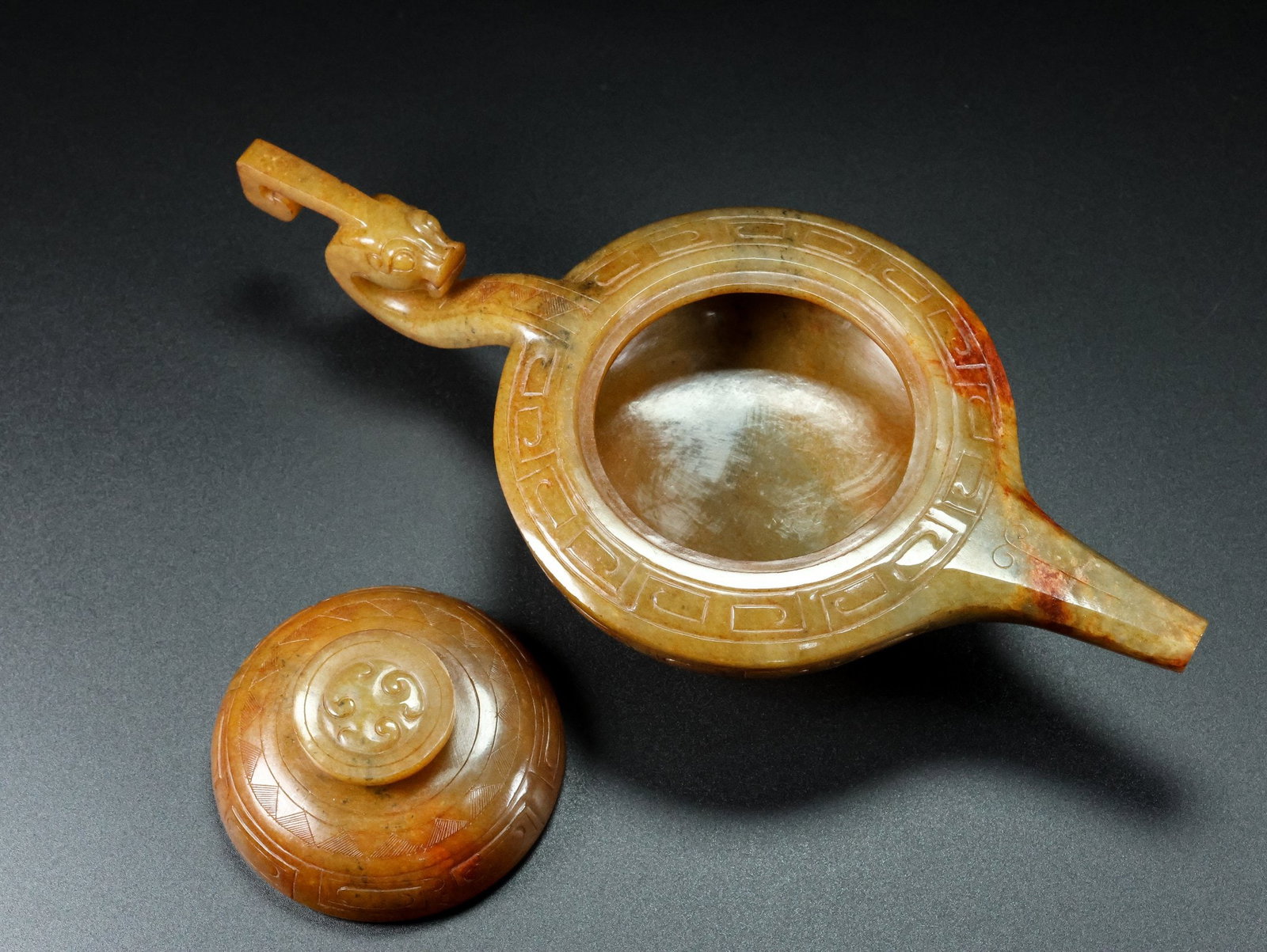 A Exquisite Hotan Jade Ewer: A Exquisite Hotan Jade Ewer,Han Dynasty, China,Size:9.1inx4.3inx2.8in ,Weight:450g 和田玉壶,中国汉代