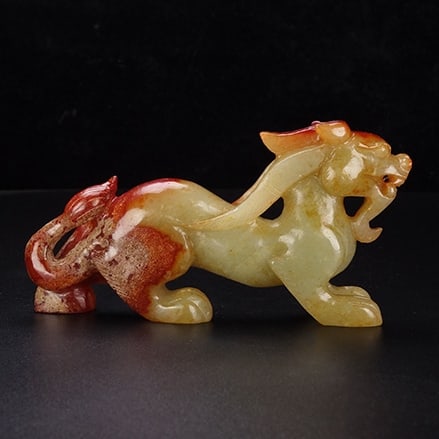 A Exquisite Hotan Jade Auspicious Beast Ornament: A Exquisite Hotan Jade Auspicious Beast Ornament,Han Dynasty, China,Size:4.3inx0.8inx2.4in ,Weight:119.6g 和田玉瑞兽摆件,中国汉代