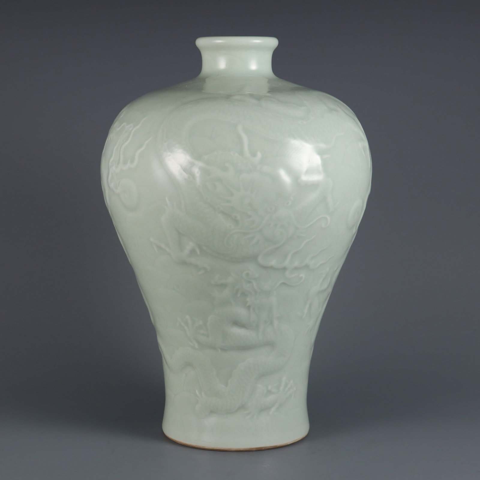 An Exquisite Celadon Glazed Seawater Pattern Dragon Pattern Vase: An Exquisite Celadon Glazed Seawater Pattern Dragon Pattern Vase Qing Dynasty, China Qianlong Six-character Mark