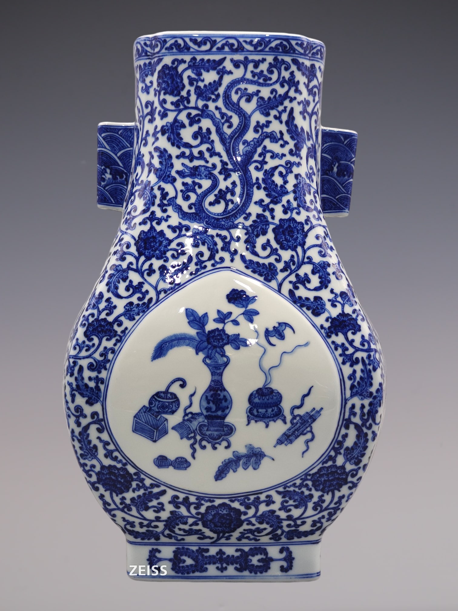An Exquisite Blue and White Lotus Pattern Double-Ears Vase: An Exquisite Blue and White Lotus Pattern Double-Ears Vase Qing Dynasty, China Qianlong Six-character Mark Size:16.3inx9.1in青花缠枝莲纹双耳瓶 