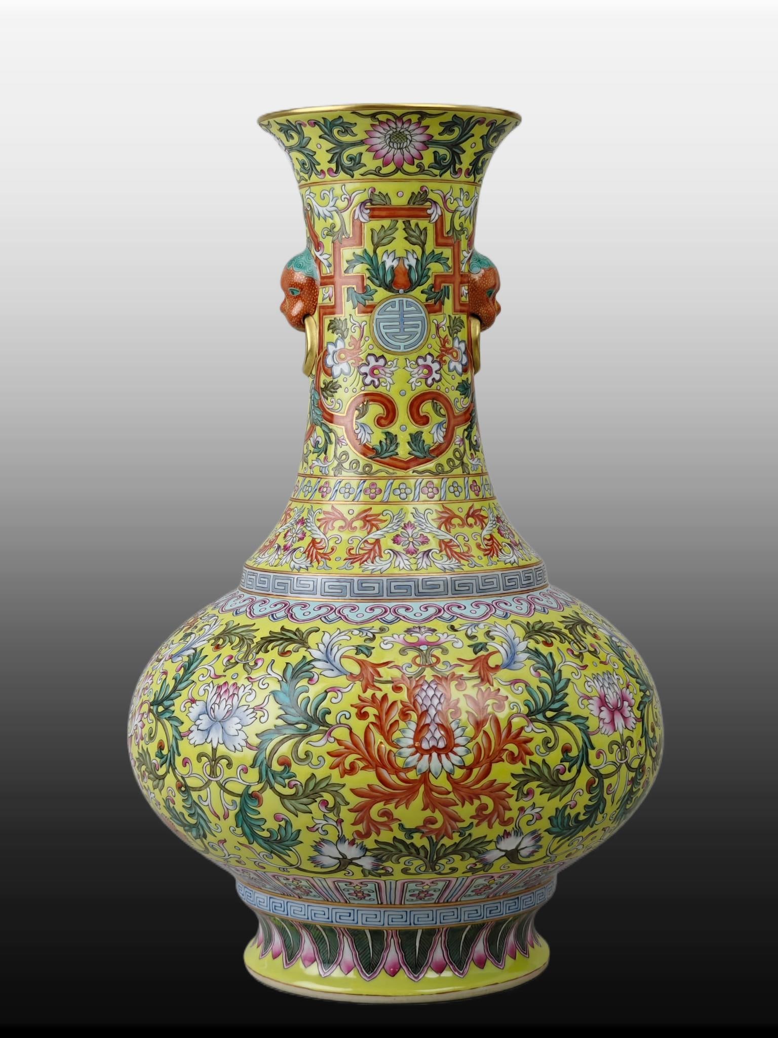 A Exquisite Famille-Rose Yellow Ground Lotus Pattern Double-Ears Vase: A Exquisite Famille-Rose Yellow Ground Lotus Pattern Double-Ears Vase,Qing Dynasty, China,Qianlong Six-character Mark,Size:14inx8.7in