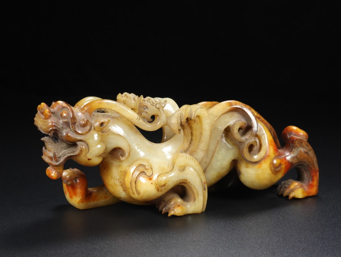A Exquisite Hotan Jade Auspicious Beast Ornament (1 of 9)