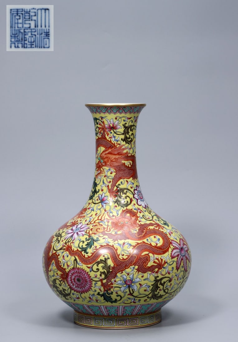 A Exquisite Yellow Ground Famille-Rose Dragon Pattern Vase: A Exquisite Yellow Ground Famille-Rose Dragon Pattern Vase,Qing Dynasty, China,Qianlong Six-character Mark,Size:12.2inx8.3inx3.5in ,Weight:2453g 黄地粉彩龙纹瓶