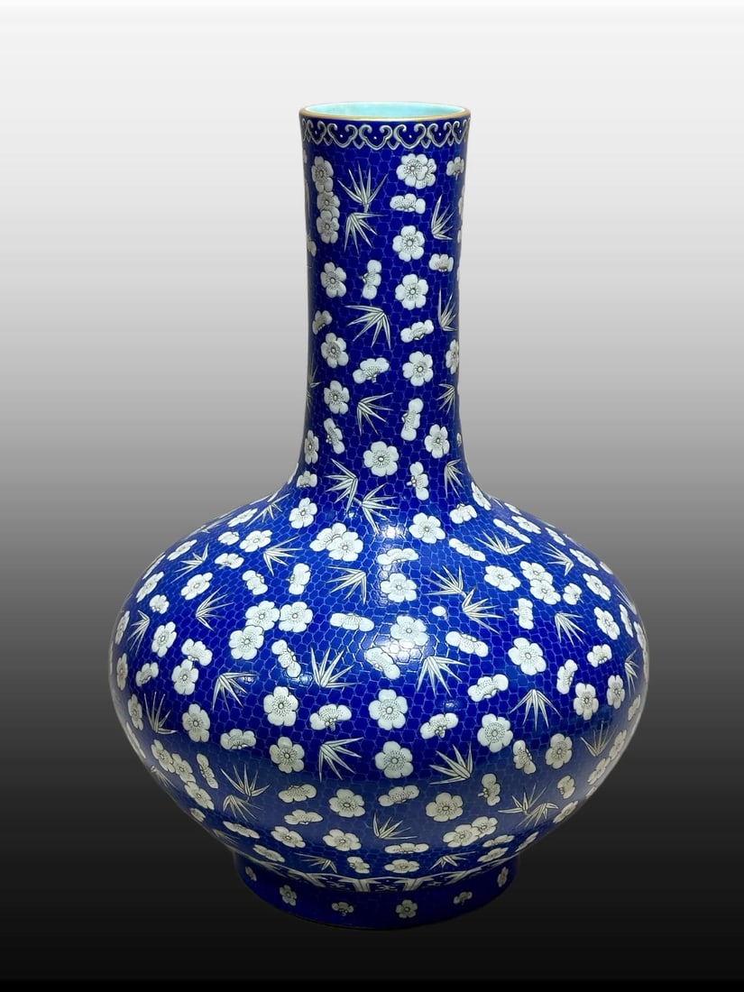 A Exquisite Gem Blue Glazed Flower Pattern Vase: A Exquisite Gem Blue Glazed Flower Pattern Vase,Qing Dynasty, China,Qianlong Four-character Mark,Size:16.6inx3.4inx11.4inx6.5in 宝石蓝釉花卉纹瓶,中