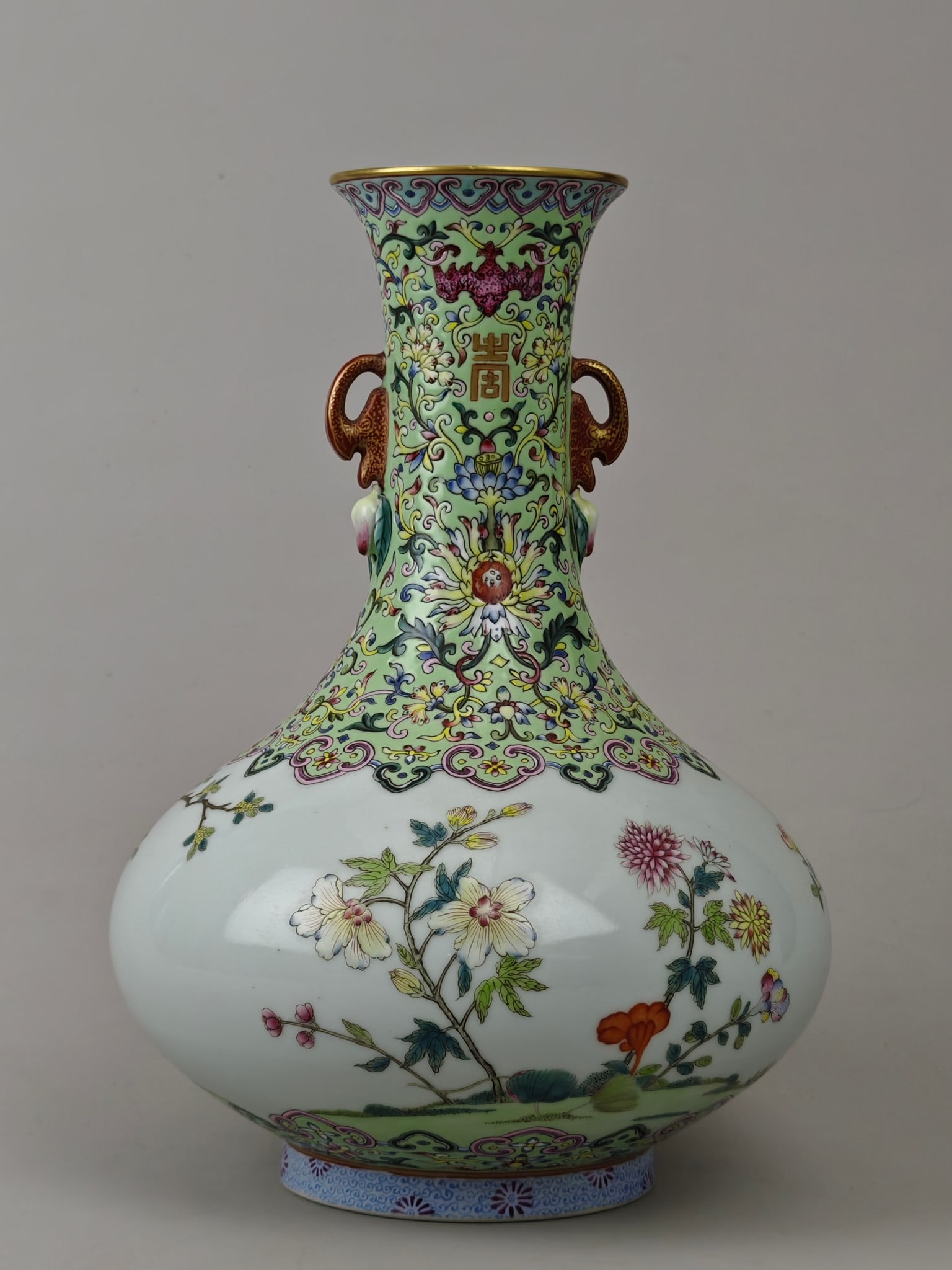 A Exquisite Famille-Rose Flower Pattern Double-Ears Vase: A Exquisite Famille-Rose Flower Pattern Double-Ears Vase,Qing Dynasty, China,Qianlong Six-character Mark,Size:11.2inx8.7in