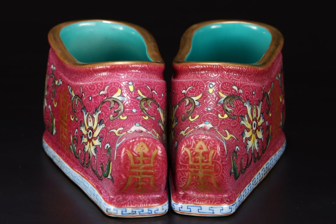 A pair of Exquisite Ruby Red-Glazed Lotus Pattern Shoes: A pair of Exquisite Ruby Red-Glazed Lotus Pattern Shoes,Qing Dynasty, China,Qianlong Six-character Mark,Size:2.4inx5.8in