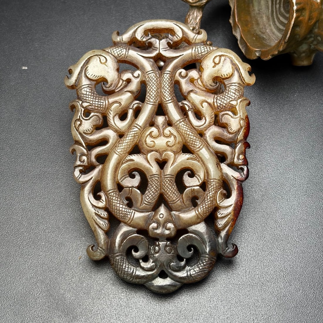 A Exquisite Hotan Jade Dragon Phoenix Pendant: A Exquisite Hotan Jade Dragon Phoenix Pendant,Han Dynasty, China,Size:3.5inx2.5inx0.2in, Weight:57g 和田玉龙凤佩,中国汉代
