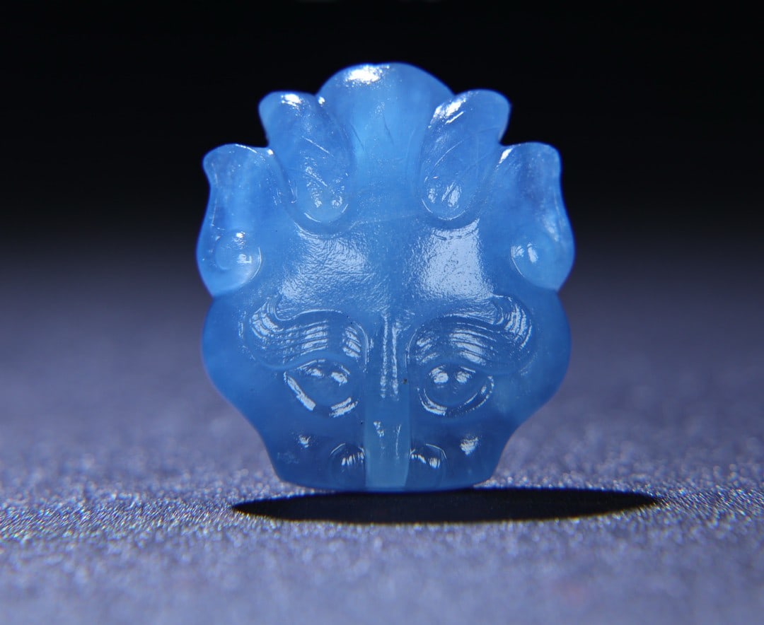 A Exquisite Aquamarine Beast-Face Handheld Carving: A Exquisite Aquamarine Beast-Face Handheld Carving,Qing Dynasty, China,Size:1.4inx1.2inx0.5in,Weight:17g 海蓝宝兽面手把件,中国清ߣ