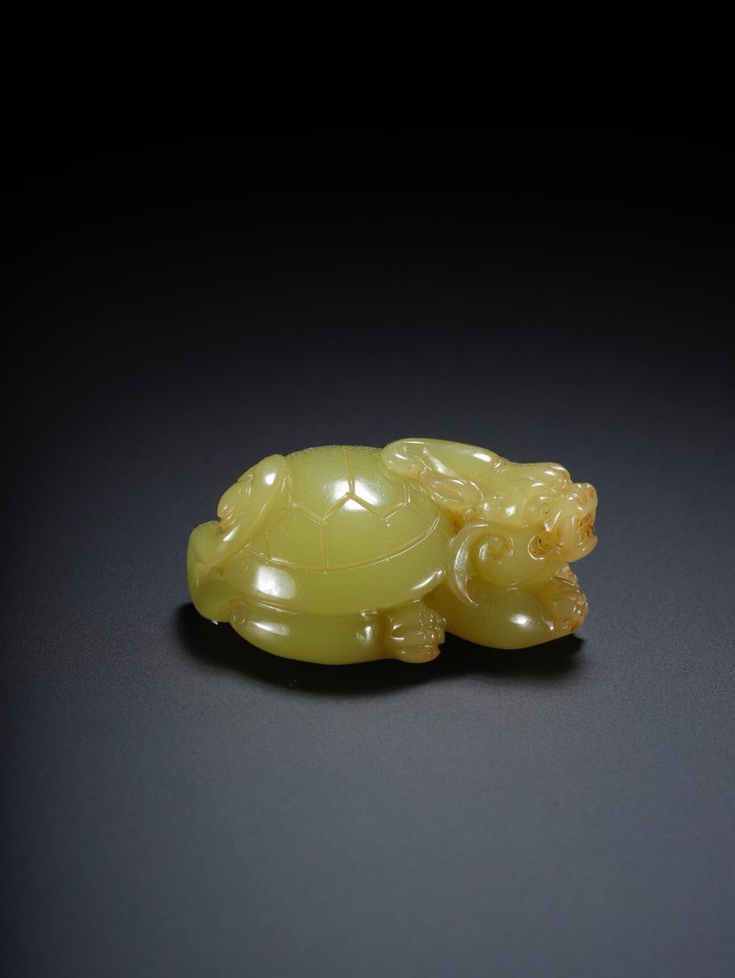A Exquisite Hotan Yellow Jade Tortoise Ornament: A Exquisite Hotan Yellow Jade Tortoise Ornament,Qing Dynasty, China,Size:2inx1.4inx1in,Weight:53.7g 和田黄玉龟摆件,中国清代