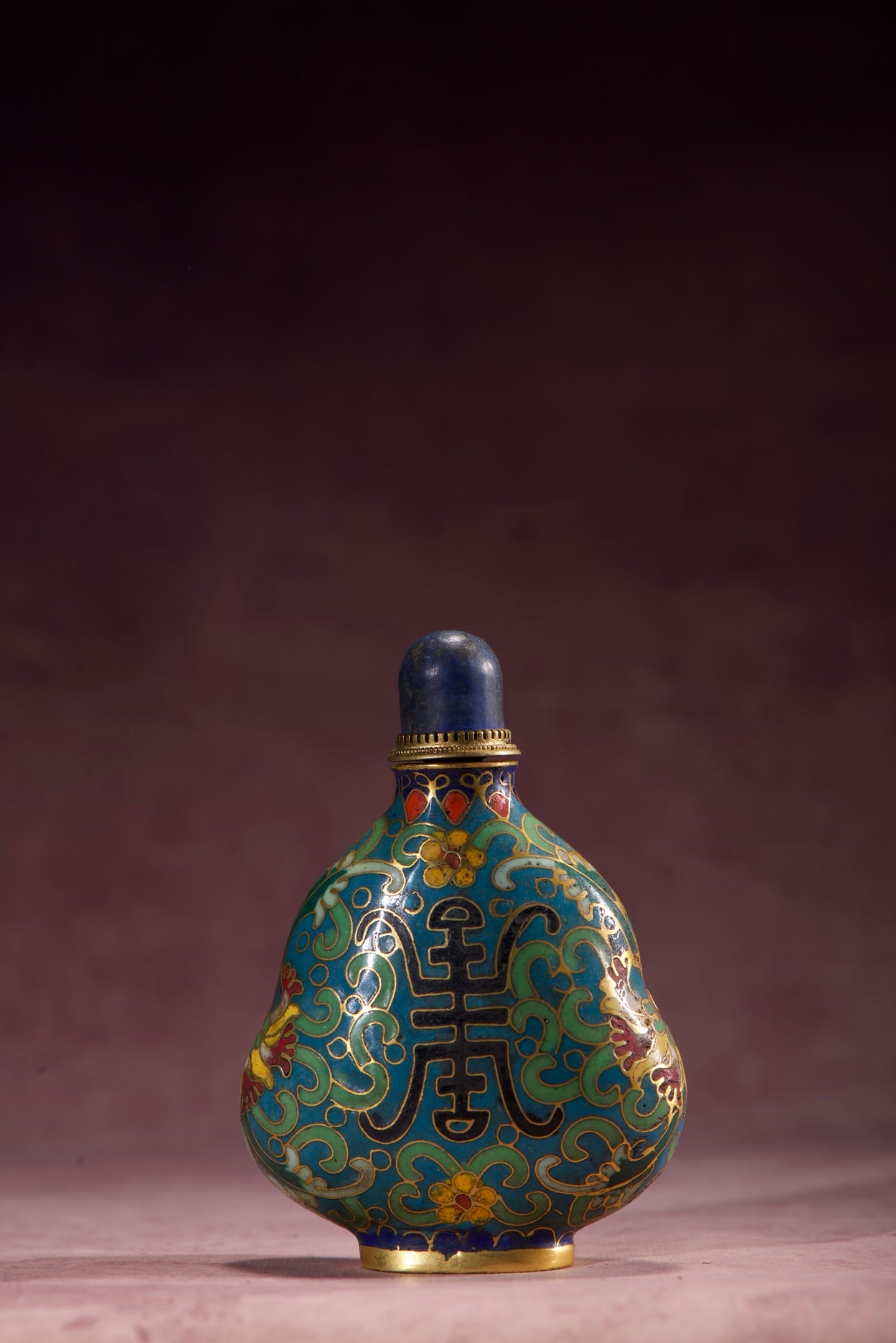 A Exquisite Cloisonne Lotus Pattern Snuff Bottle: A Exquisite Cloisonne Lotus Pattern Snuff Bottle,Qing Dynasty, China,Qianlong Four-character Mark,Size:3.2inx2.2inx1.2in,Weight:63g 铜胎掐丝珐琅缠枝!