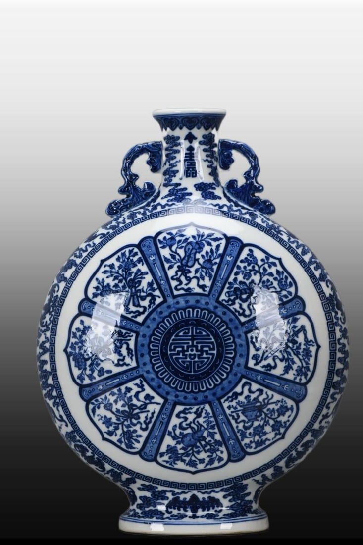 A Exquisite Blue and White Eight Treasures Pattern Vase: A Exquisite Blue and White Eight Treasures Pattern Vase,Qing Dynasty, China,Qianlong Six-character Mark,Size:16.4inx11.8inx6in