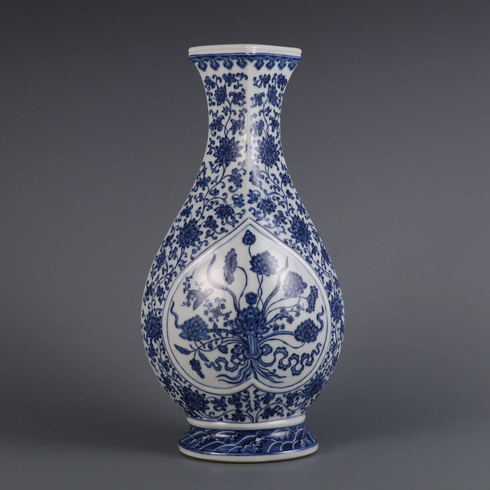 A Exquisite Blue and White Lotus Pattern Vase: A Exquisite Blue and White Lotus Pattern Vase,Qing Dynasty, China,Qianlong Six-character Mark,Size:13.7inx6.7inx3.7in 青花缠枝莲纹瓶,中国清&