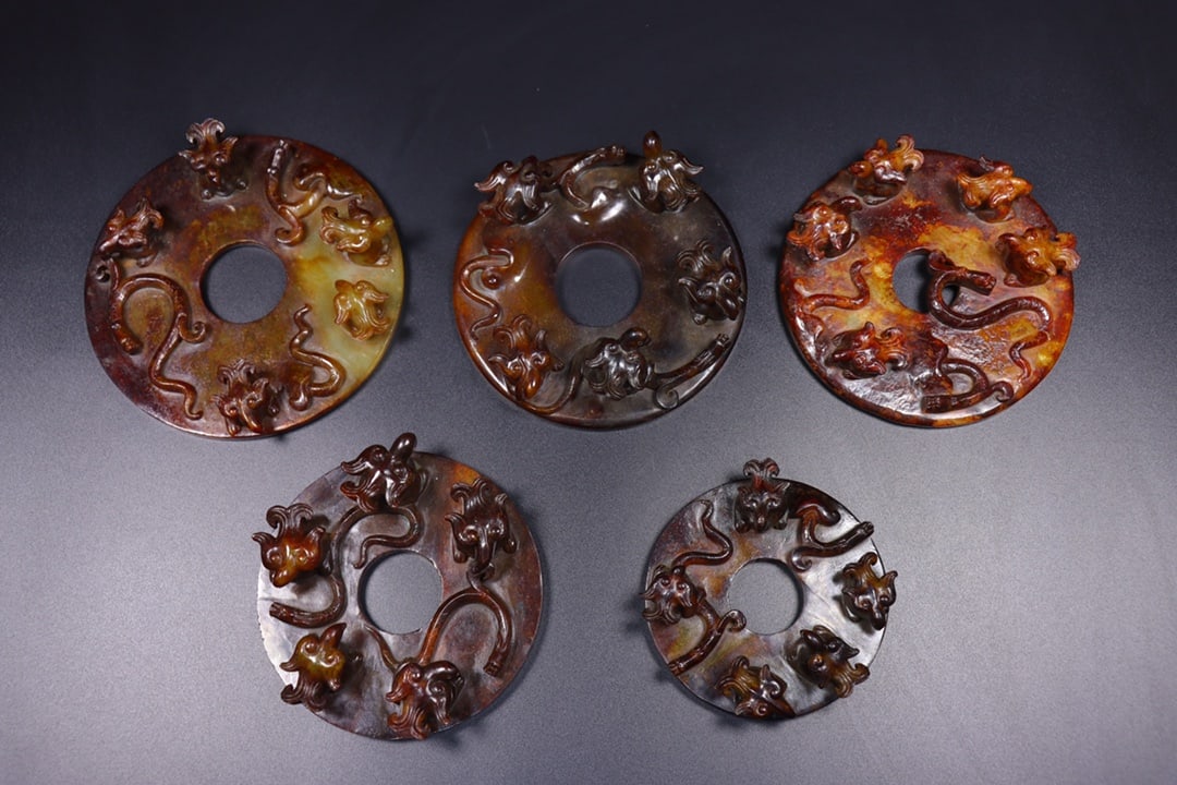 A Set of Exquisite Hotan Jade Bi (1 of 9)