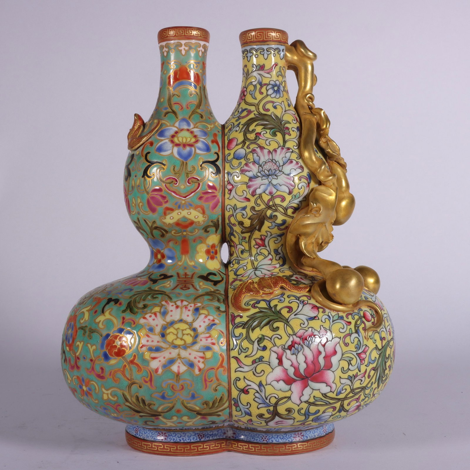 A Exquisite Enamel Painted Gold Lotus Pattern Gourd Vase: A Exquisite Enamel Painted Gold Lotus Pattern Gourd Vase,Qing Dynasty, China,Qianlong Six-character Mark,Size:8inx5.9in 珐琅彩描金缠枝莲纹葫