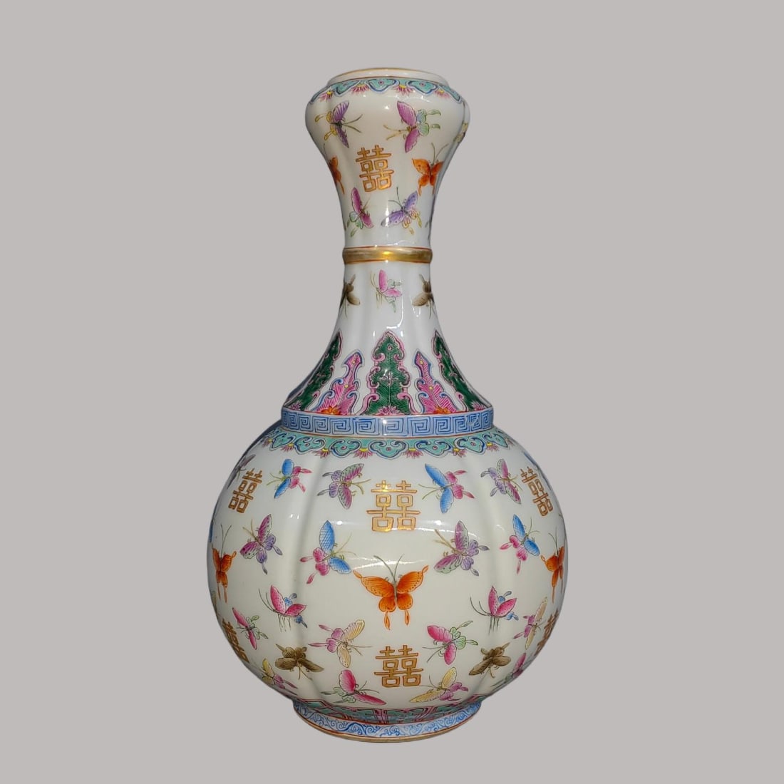A Exquisite Famille-Rose Flower and Butterfly Pattern Vase: A Exquisite Famille-Rose Flower and Butterfly Pattern Vase,Qing Dynasty, China,Jiaqing Six-character Mark,Size:11inx2inx5.9in 粉彩蝴蝶纹瓶,中国清&