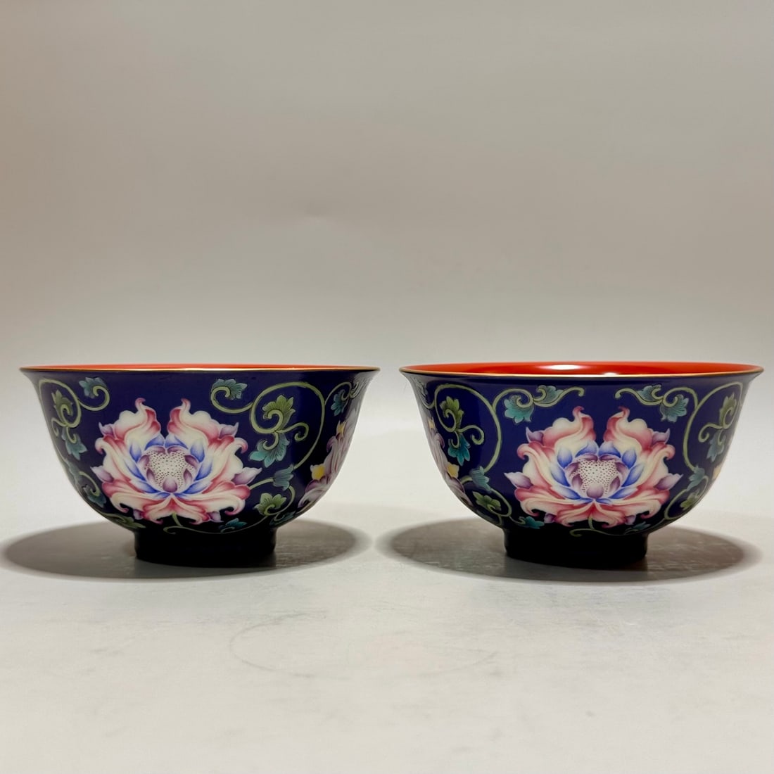 A pair of Exquisite Enamel Blue Ground Flower Pattern Bowl: A pair of Exquisite Enamel Blue Ground Flower Pattern Bowl,Qing Dynasty, China,Qianlong Six-character Mark,Size:2.4inx4.5inx1.8in