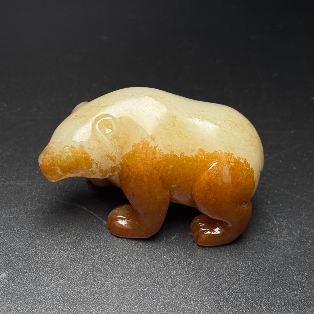 A Exquisite Hotan Jade Bear Ornament: A Exquisite Hotan Jade Bear Ornament,Han Dynasty, China,Size:2.3inx1.4inx1.2in ,Weight:88g 和田玉熊摆件,中国汉代