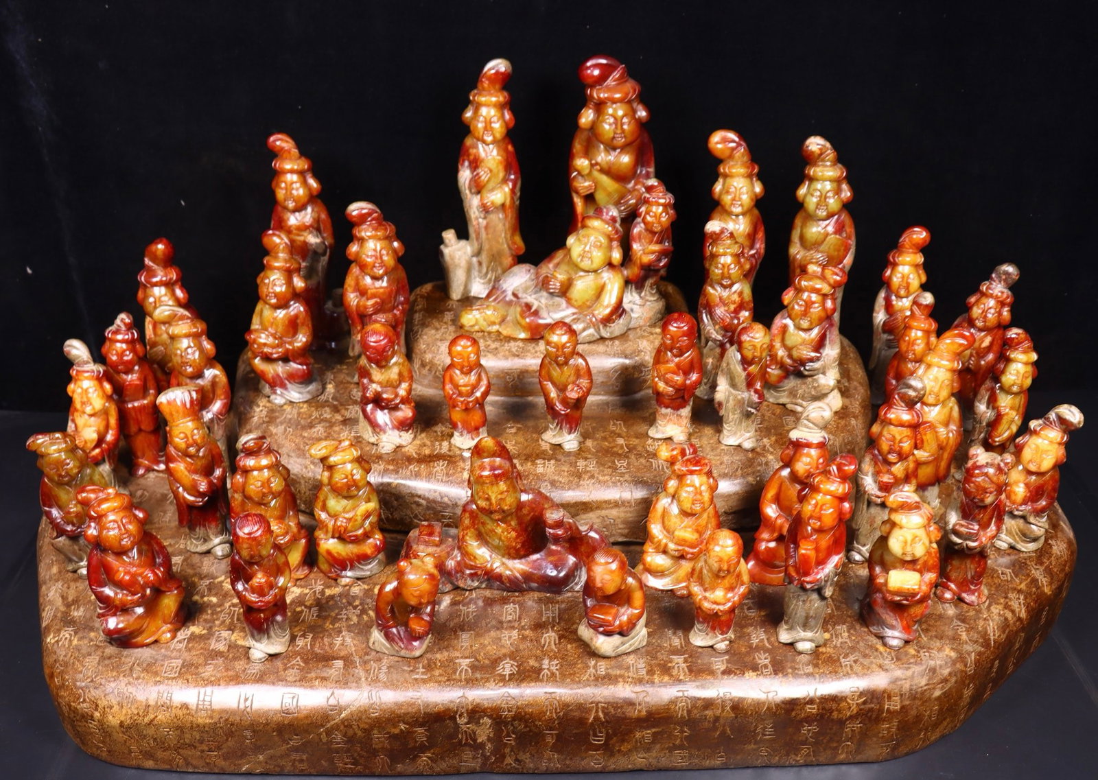 A Set of Exquisite Hotan Jade Figures Ornament: A Set of Exquisite Hotan Jade Figures Ornament,Tang Dynasty, China,Size: 2.6inx2inx7.9in(Adult Figure), 1.6inx1.6inx2.8in(Child Figure), 6.7inx15.7inx6.3in(Base),Weight:932g,143g