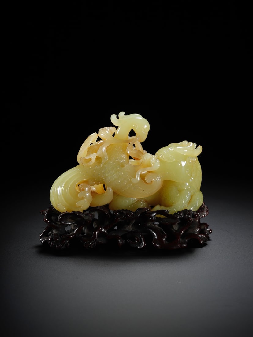 A Exquisite Hotan Yellow Jade Dragon and Phoenix Pattern Ornament: A Exquisite Hotan Yellow Jade Dragon and Phoenix Pattern Ornament,Qing Dynasty, China,Size:3.9inx1.7inx2.5in,Weight:275.7g
