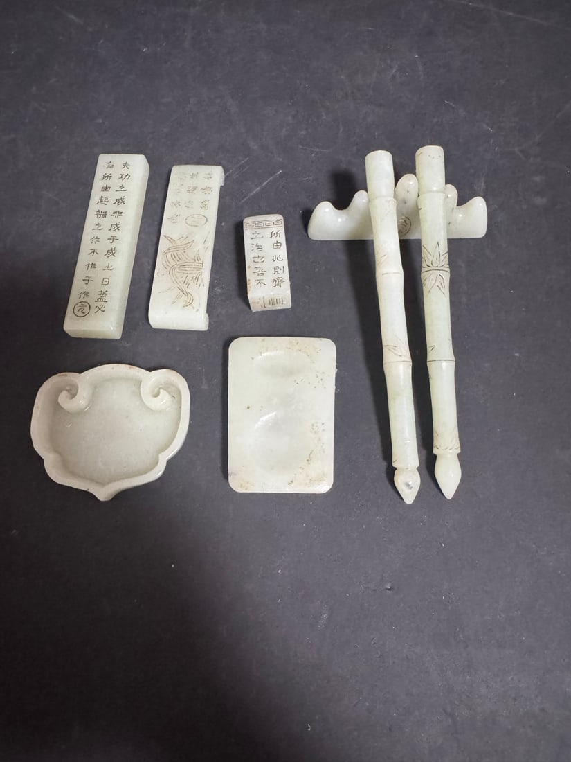 A Set of Exquisite Hotan Jade Four Treasures of the Study: A Set of Exquisite Hotan Jade Four Treasures of the Study,Qing Dynasty, China,Qianlong Four-character Mark,Size:6.3in(Pen),2in(Seal),3.7in(PenRest),2.8in(WashingVessel),Weight:435g