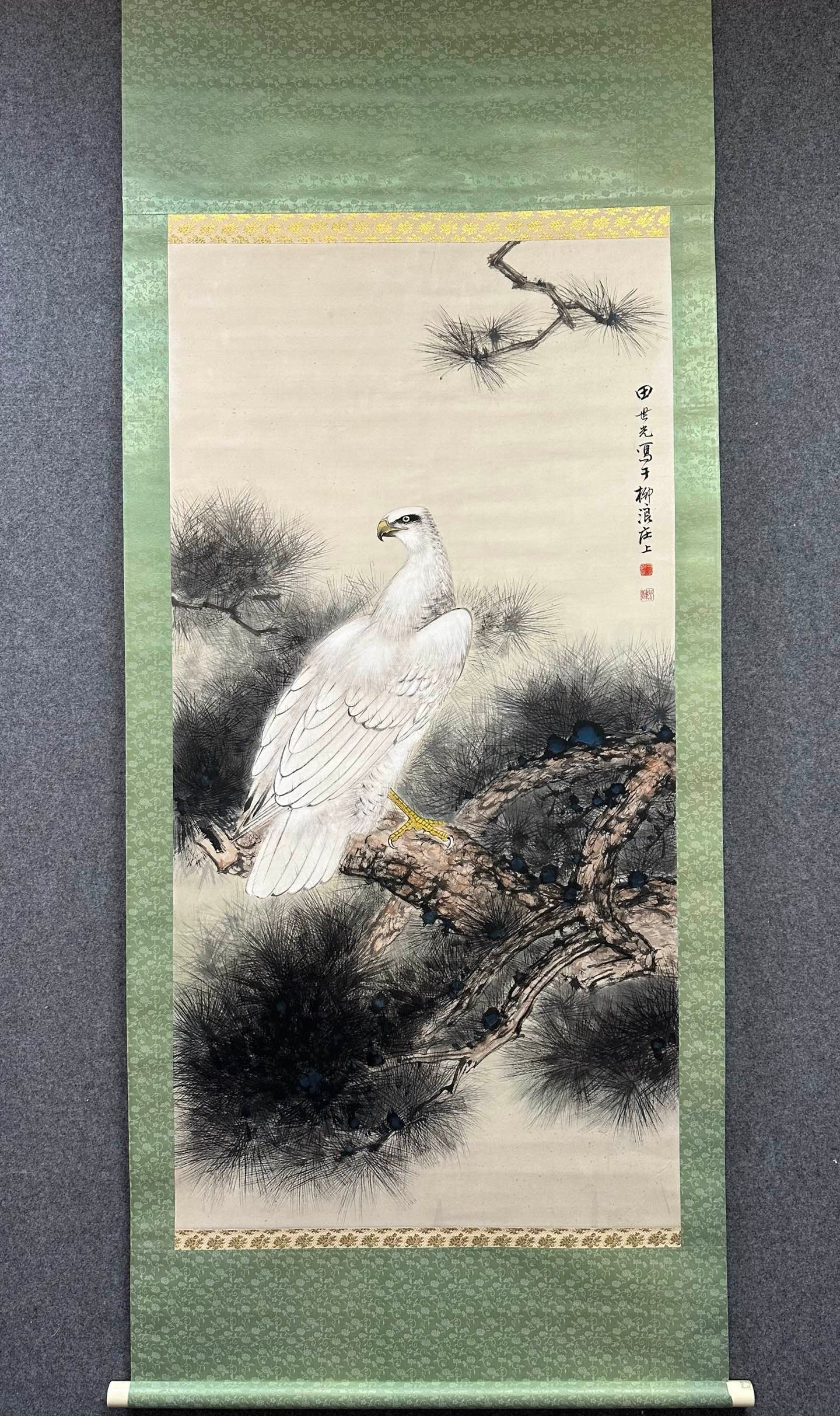 A Chinese Vertical Scroll Ink Painting of Eagle on Paper: A Chinese Vertical Scroll Ink Painting of Eagle on Paper,Modern Period of China,Tian Shiguang,without frame size:27.2inx53.1in 一幅中国水墨纸本鹰&