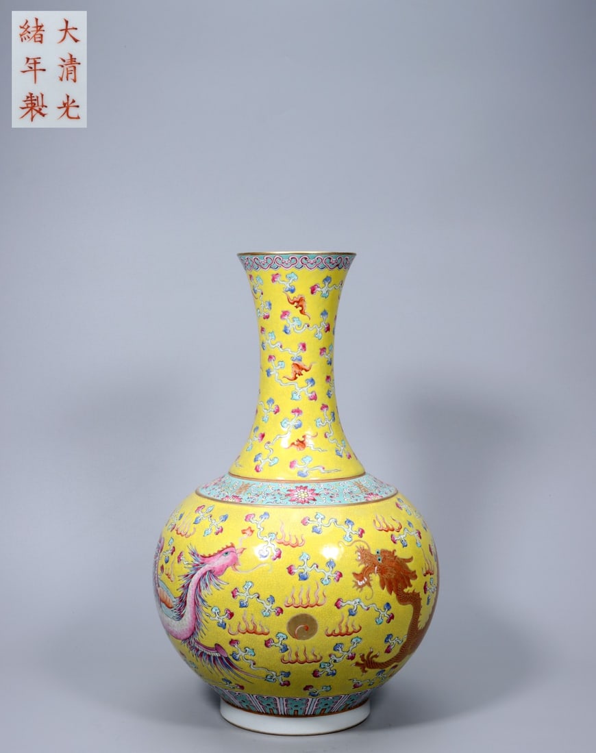 A Exquisite Yellow Ground Painted Gold Famille-Rose Dragon and Phoenix Pattern Vase: A Exquisite Yellow Ground Painted Gold Famille-Rose Dragon and Phoenix Pattern Vase,Qing Dynasty, China,Guangxu Six-character Mark,Size:15.6inx9.3inx3.9in ,Weight:2713g 黄地描金