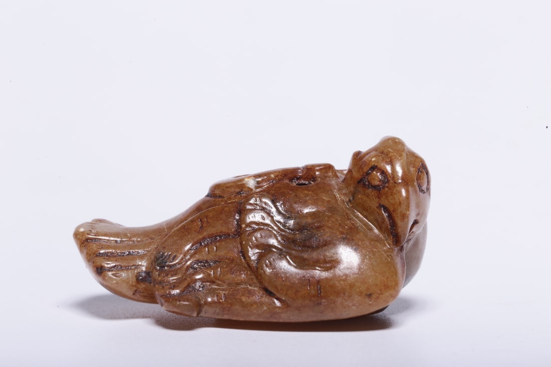 A Exquisite Hotan Jade Bird Handheld Carving: A Exquisite Hotan Jade Bird Handheld Carving,Han Dynasty, China,Size:1.6inx1.3inx0.7in ,Weight:23g 和田玉鸟手把件,中国汉代