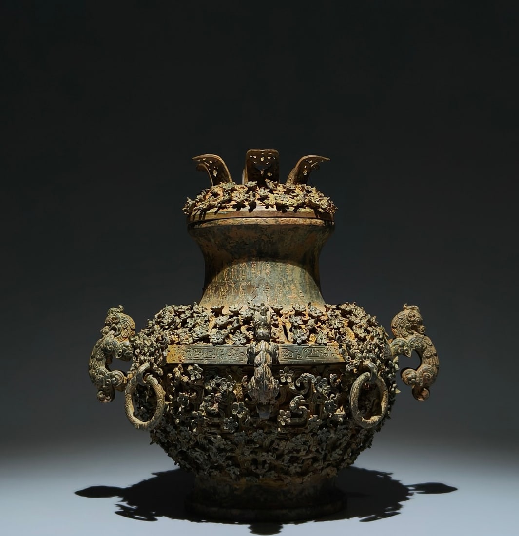 A Exquisite Bronze Dragon Pattern Beast-Ears Ewer: A Exquisite Bronze Dragon Pattern Beast-Ears Ewer,Han Dynasty, China,Size:10.6inx10.2inx7.9in 青铜龙纹兽耳壶,中国汉代